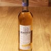 bouteille de Farigoule de Forcalquier Distilleries de Provence sur une table en bois