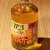 bouteille Liqueur Honey Rhum Ferroni sur table en bois