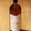 bouteille de Overaged Malt Whisky Michel Couvreur sur une table en bois