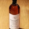 bouteille de Whisky Intravaganza Michel Couvreur sur une table en bois
